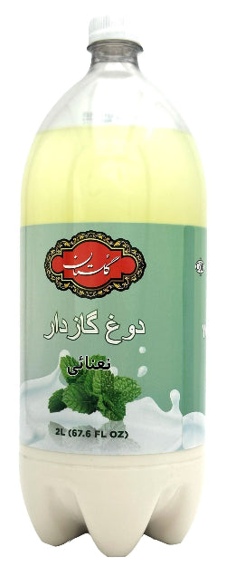 A 2L plastic bottle of Persian mint soda (Dooq Garezdar) with a light green label, white cap, and white base, containing a pale yellowish liquid.